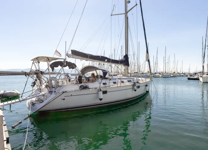 Jeanneau Sun Odyssey Sailing experience with aperitivo and crystal-clear coves