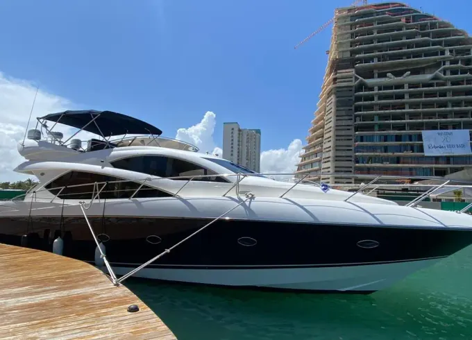 Enjoy Cancun and Isla Mujeres in style on 66' Sunseeker Manhattan for 18 people