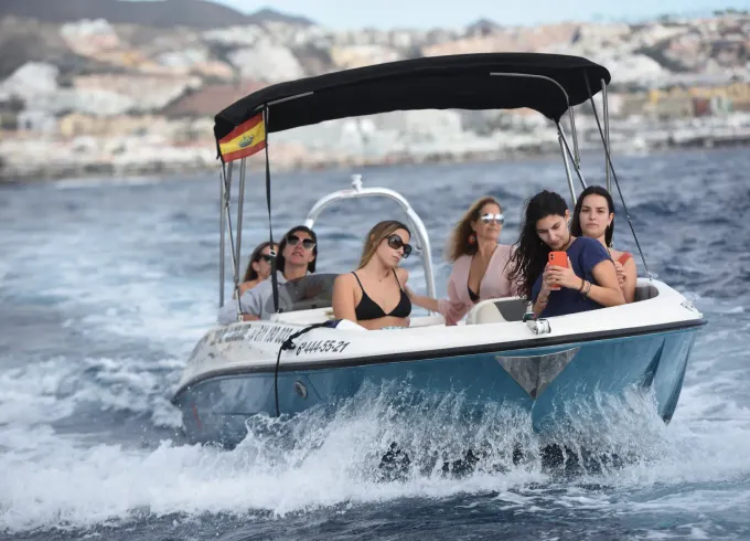 Happy boat. Motor Boat