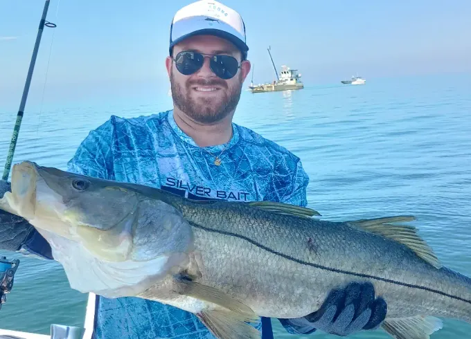 Embark on a fishing trip with SeaHunt 22ft CC as you reel in the big one!!