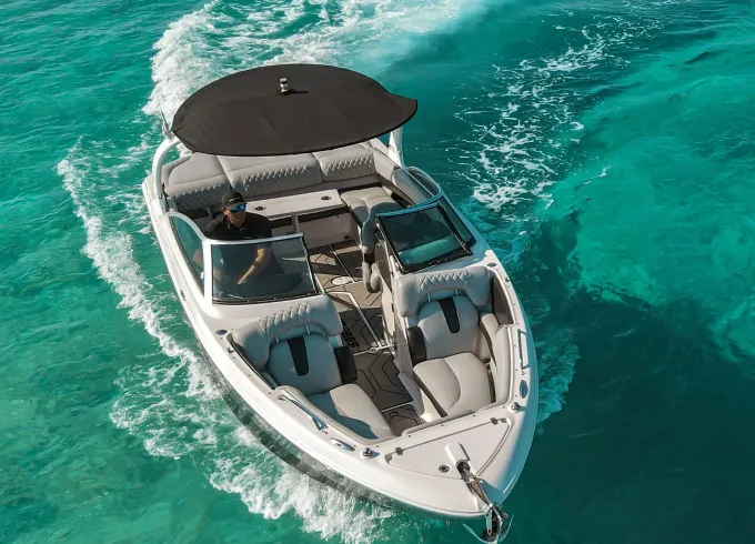 Enjoy Cancun on our 26ft Trick Four Winns Boat