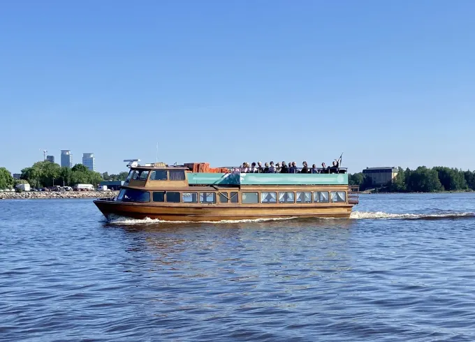 Enjoy the best part of Helsinki by sea with this vintage 50ft Mahogany Boat