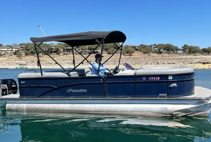 #1 24' Manitou Oasis Deluxe Tritoon on Lake Travis
