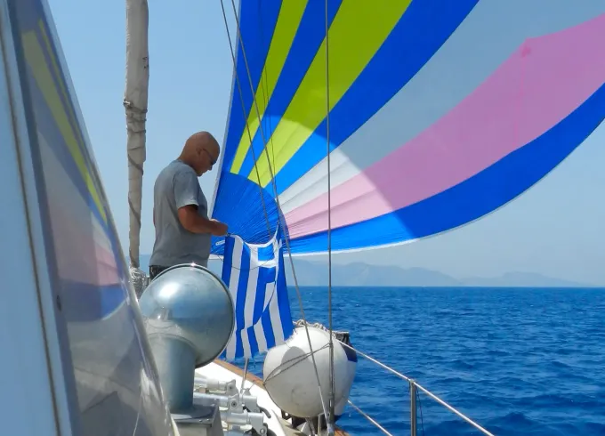 Sail cruising among the Dodecanese islands in Greece