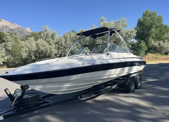 24 foot Reinell Boat for Wakeboarding and Tubing