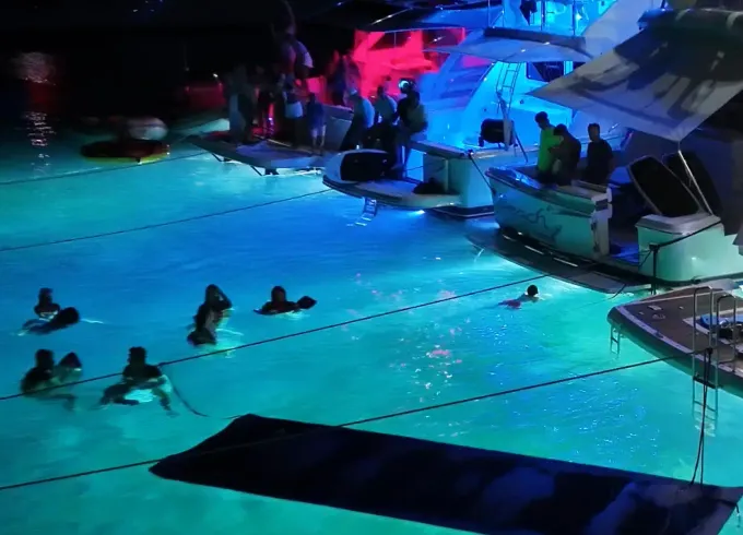 Luxurious Nighttime Yacht Experience with Underwater LED Lights