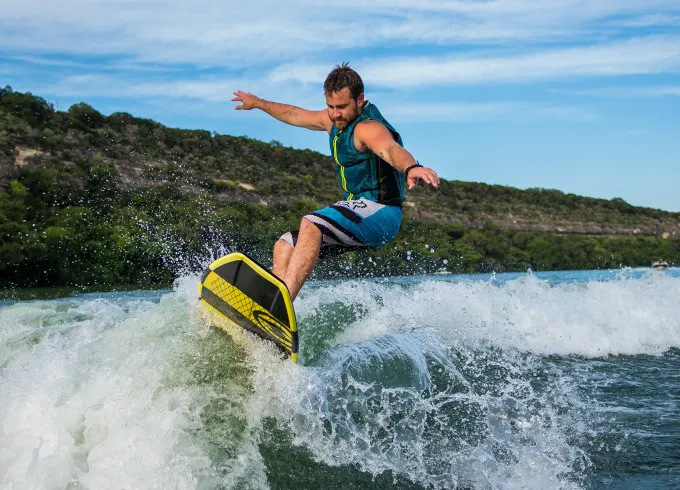 Surf and Wakeboard on Lake Travis! We Have a Fleet of Boats!