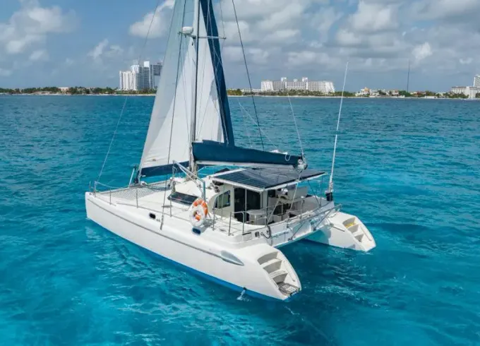 Sail Away in Style: Private 37ft Catamaran Charter in Cancún for up to 25 Guests