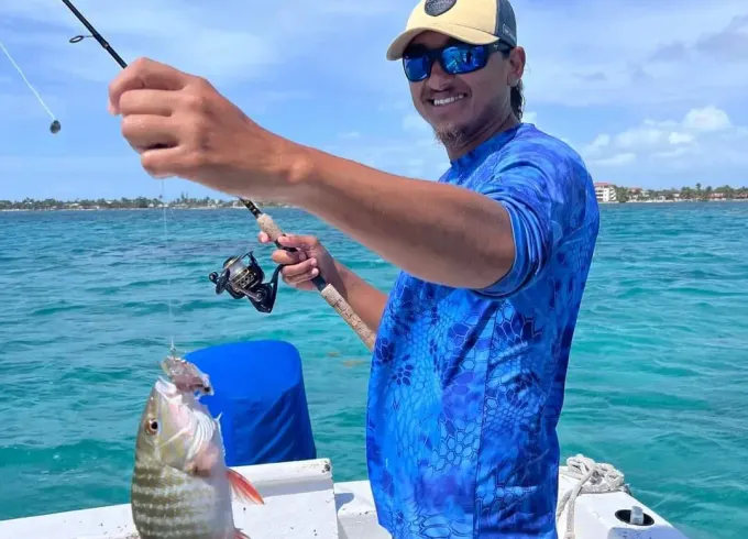 Reef Fishing, Snorkeling and Beach BBQ tour in San Pedro, Belize.