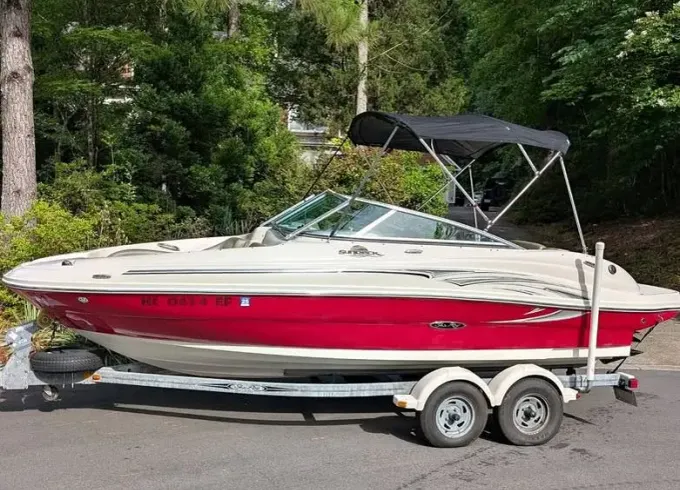 Enjoy the day out on the water, aboard a 21-foot power boat!