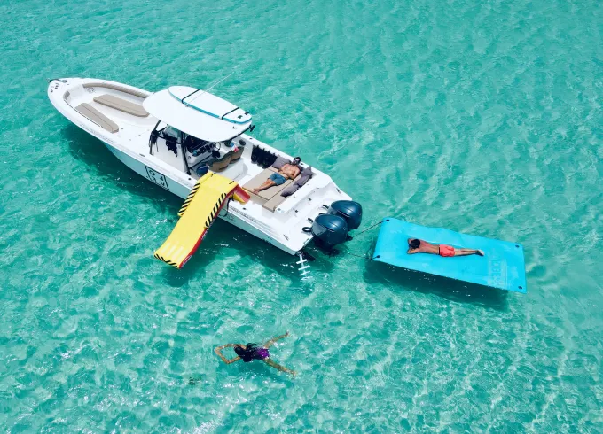 Fun 700Hp 35ft Wellcraft Scarab Boat Charter with Waterslide & Toys