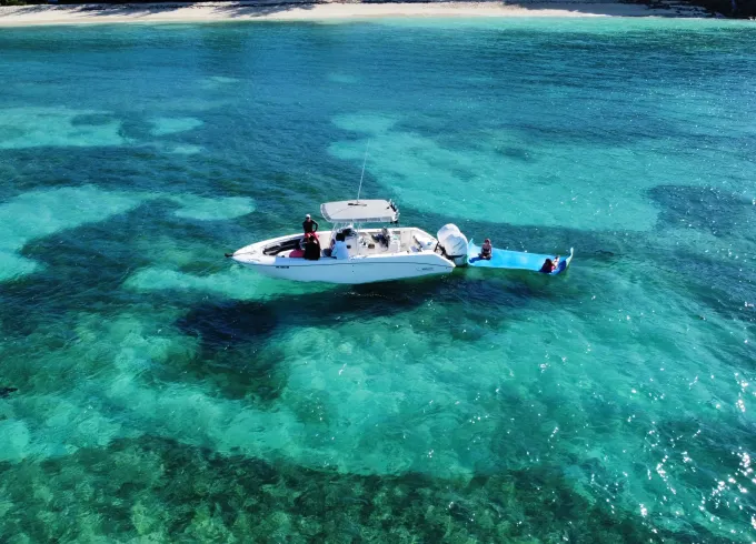 Snorkeling, Sips & Bites: Private Boat Experience
